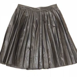 Black faux leather A-line skirt.
